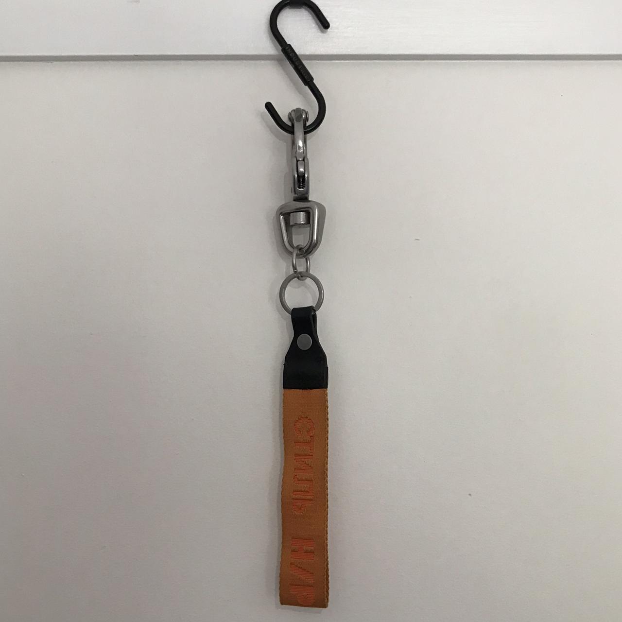 Heron Preston CTNMB Tape Keychain. Metal clip is...