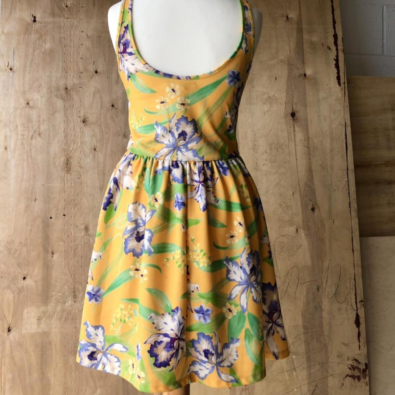 Yellow Zara skater dress with floral pattern. Size... Depop