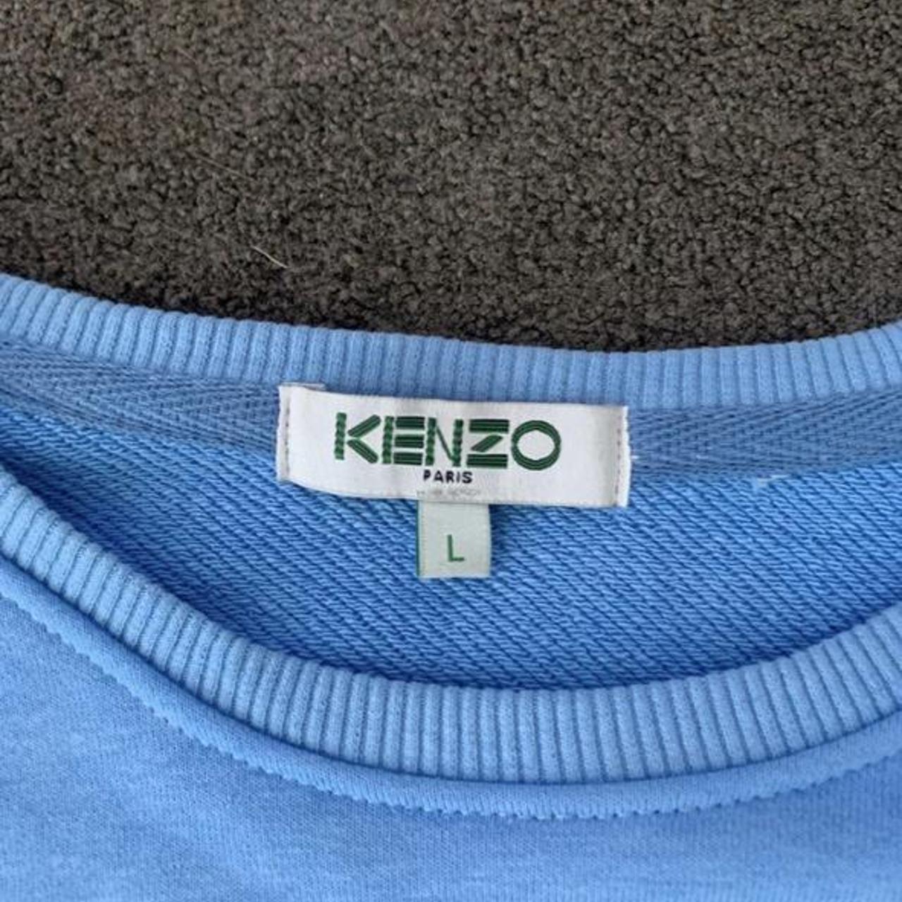 Blue kenzo jumper. It says size L but it’s a bit... Depop