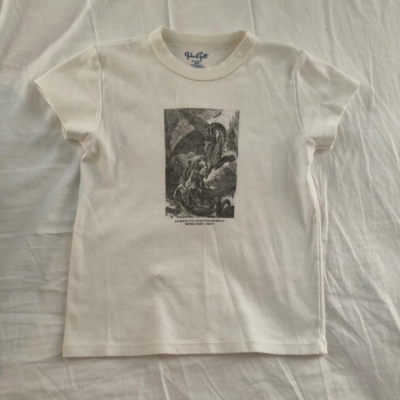 BRANDY TEE graphic baby tee with a graphic of st... Depop
