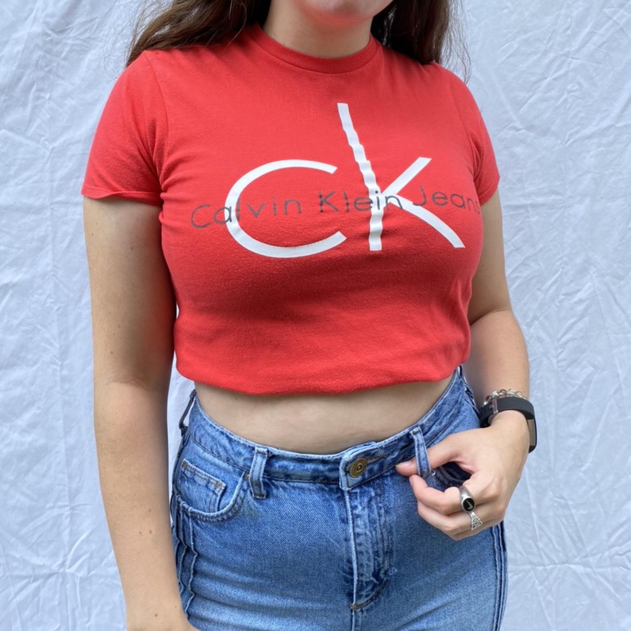 Y2k style red Calvin Klein baby tee graphic tshirt.... Depop