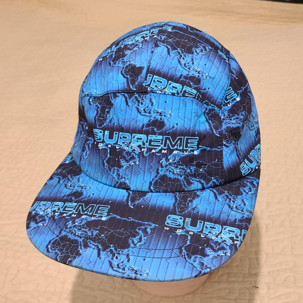 Supreme World Wide 5 panel strapback hat. Features...