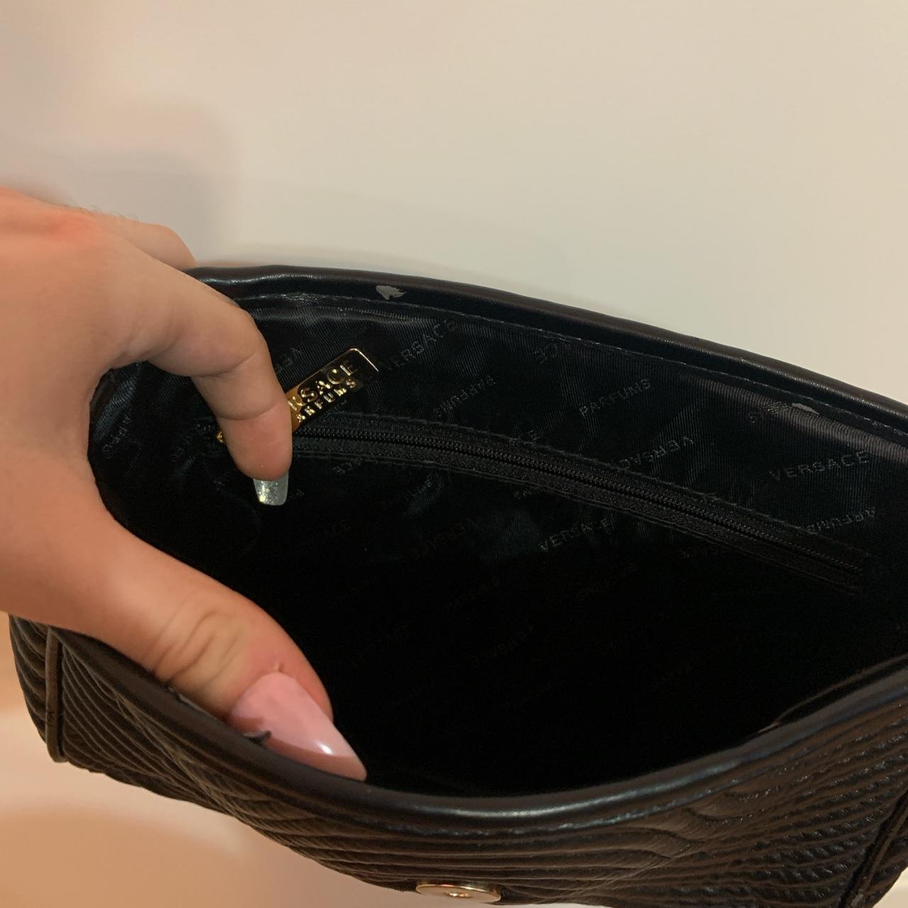 black versace parfums clutch hand bag in perfect... Depop