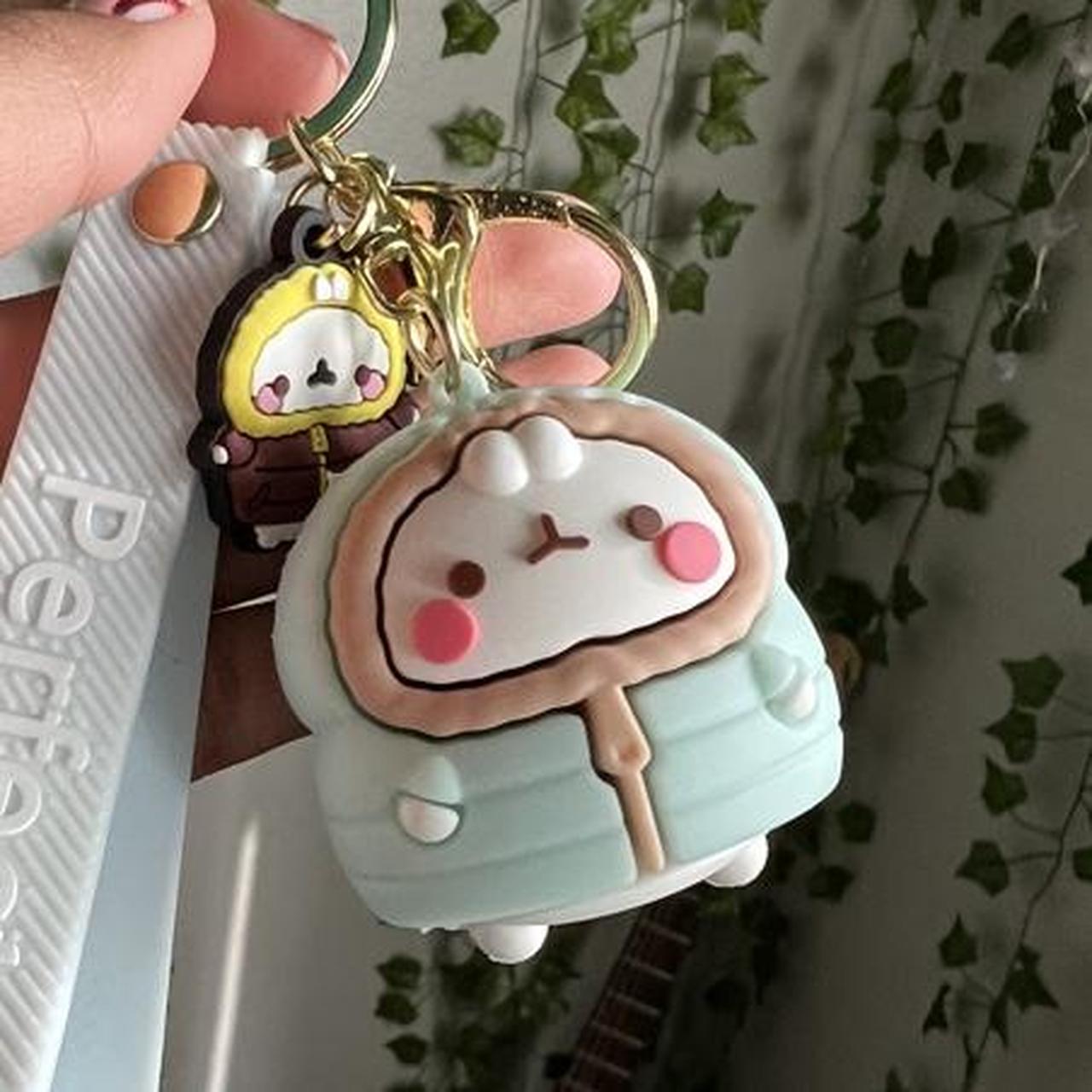 Molang snow suit keychain available: 5 #molang... - Depop