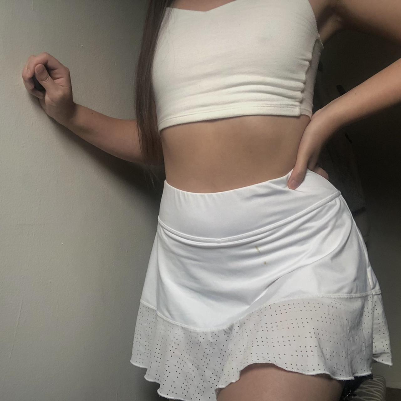 Here is a v cute tennis dress. Throw on some spandex - Depop