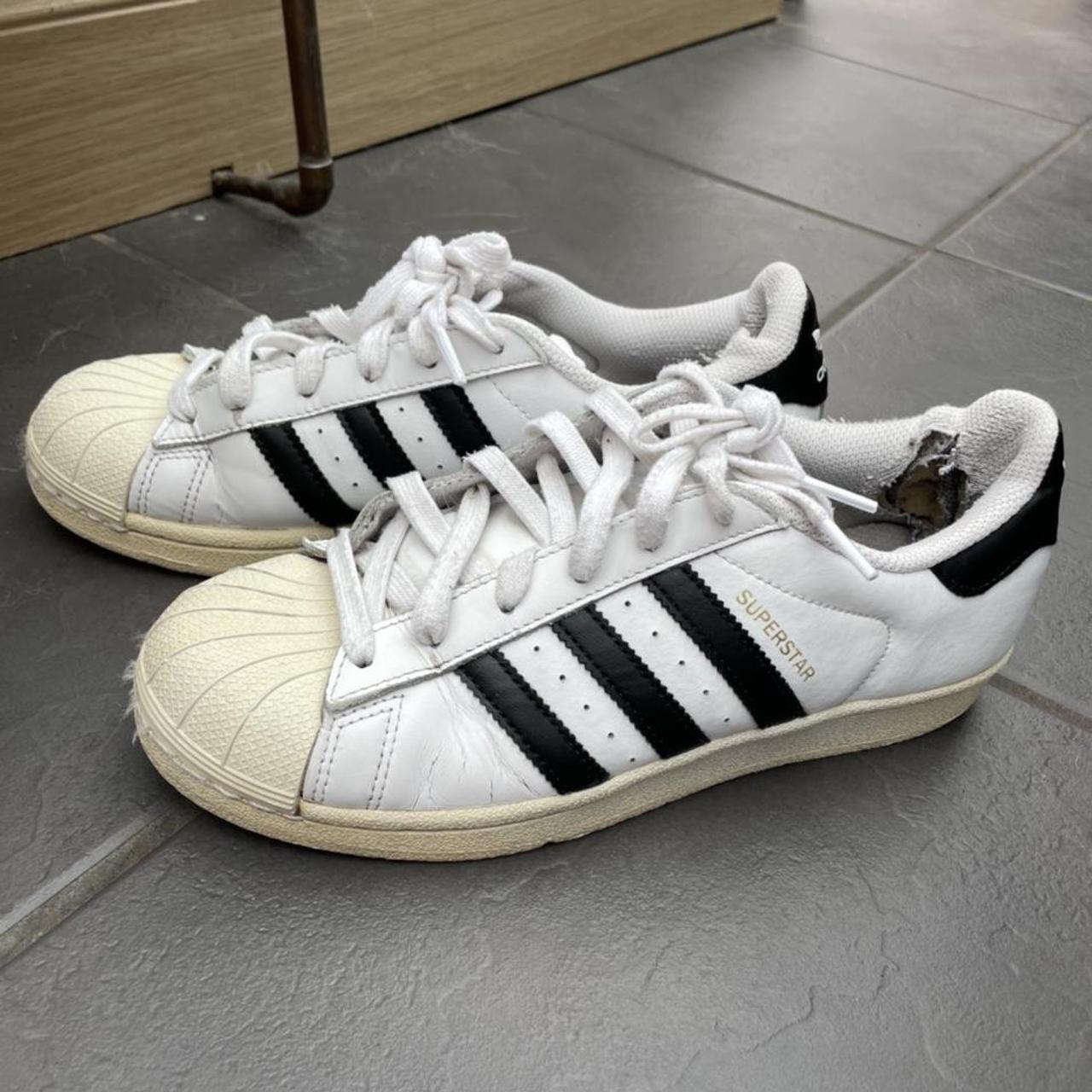 Adidas original superstars size 5, discoloured and... - Depop