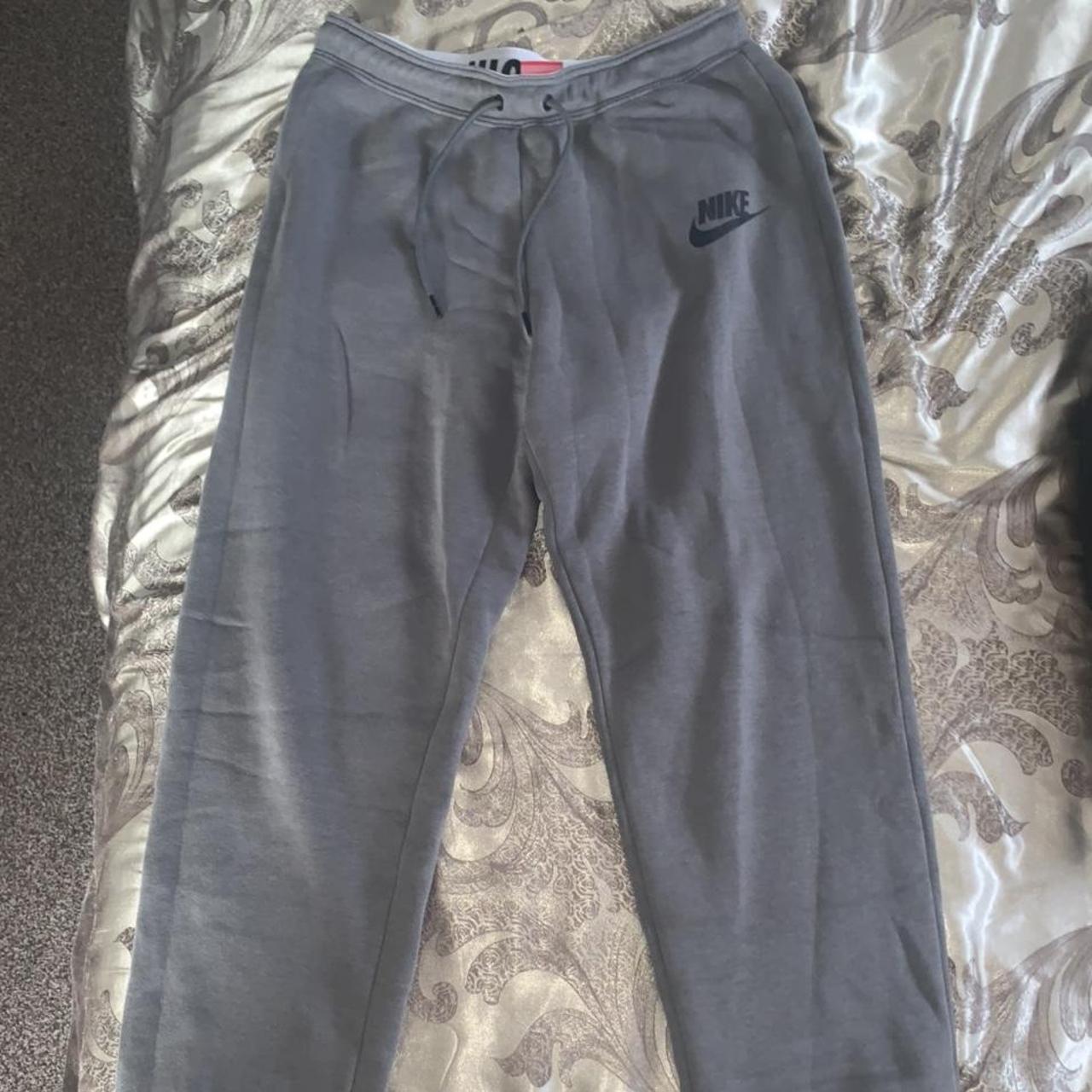 grey just do it nike tracksuit bottoms size medium... - Depop