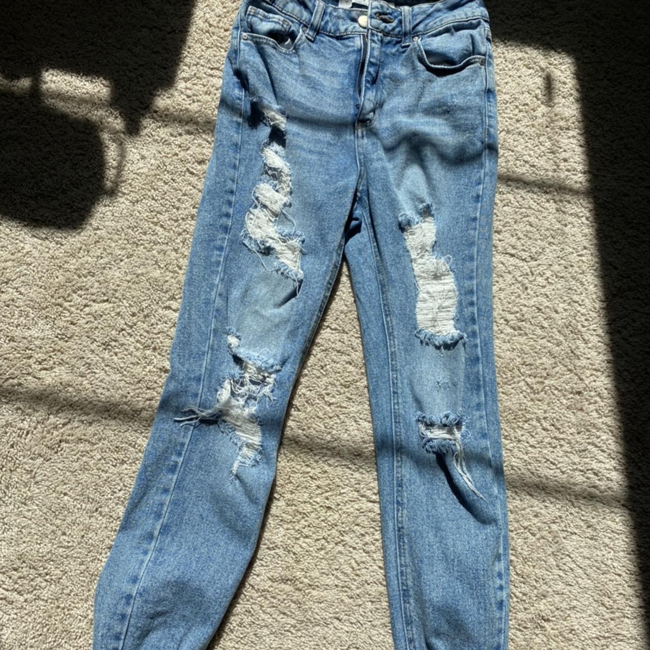 cute ripped mom jeans!! really sturdy and the rips... - Depop