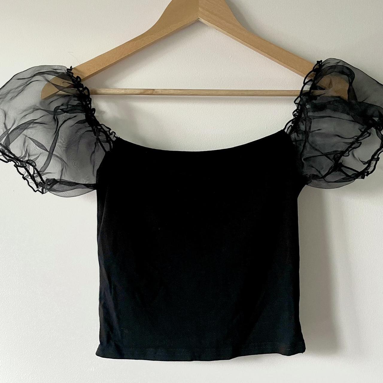 Black cotton sculptural top with puffed sleeves