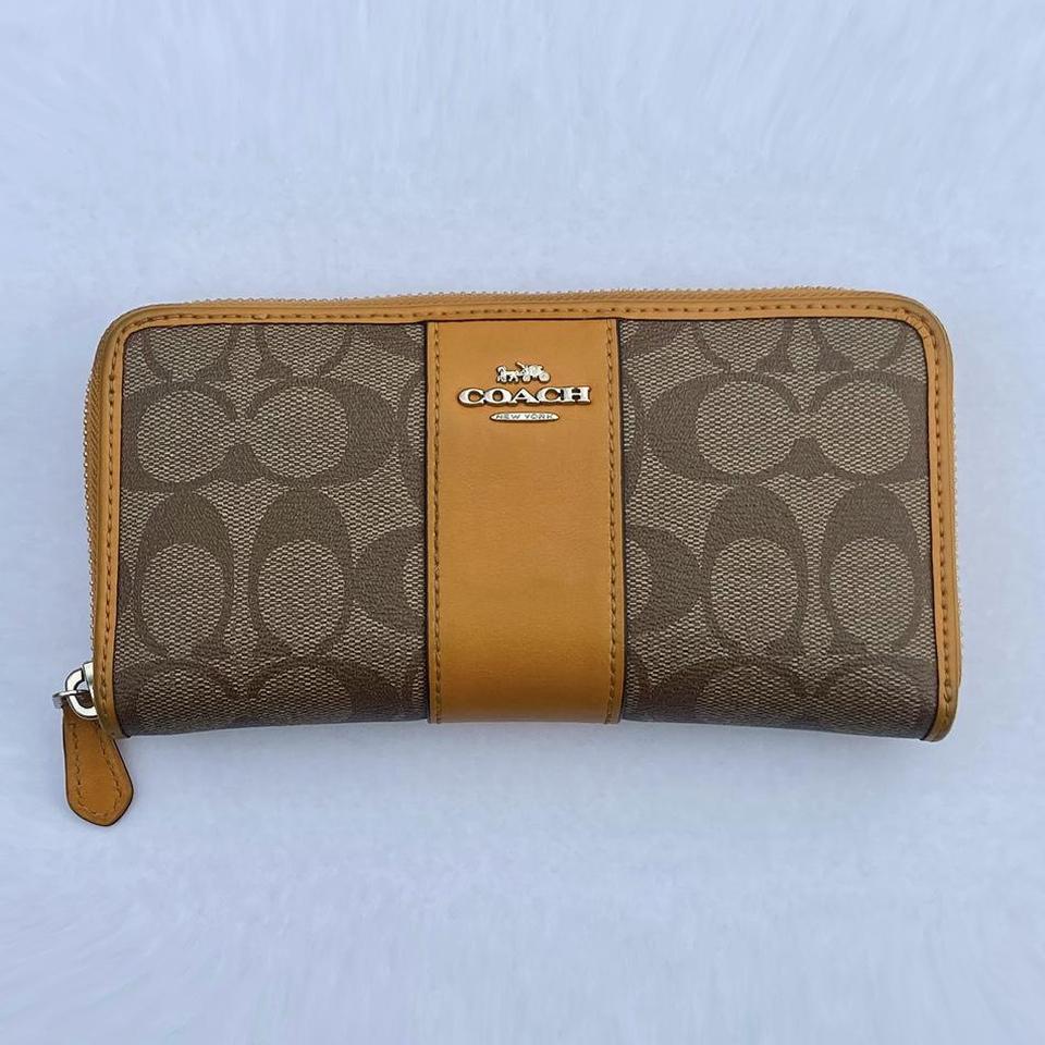 tangerine coach wallet