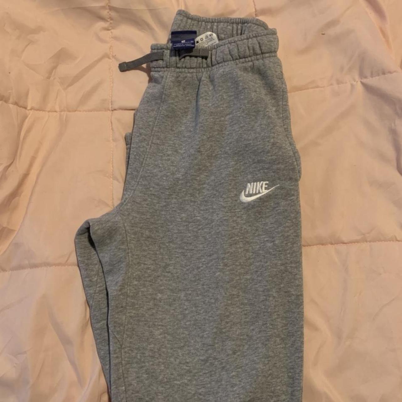 Grey nike sweatpants Size xl in boys Fits size... - Depop