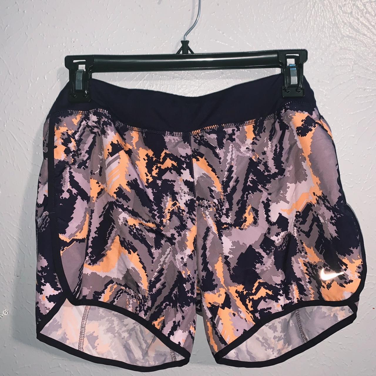 orange and purple nike shorts