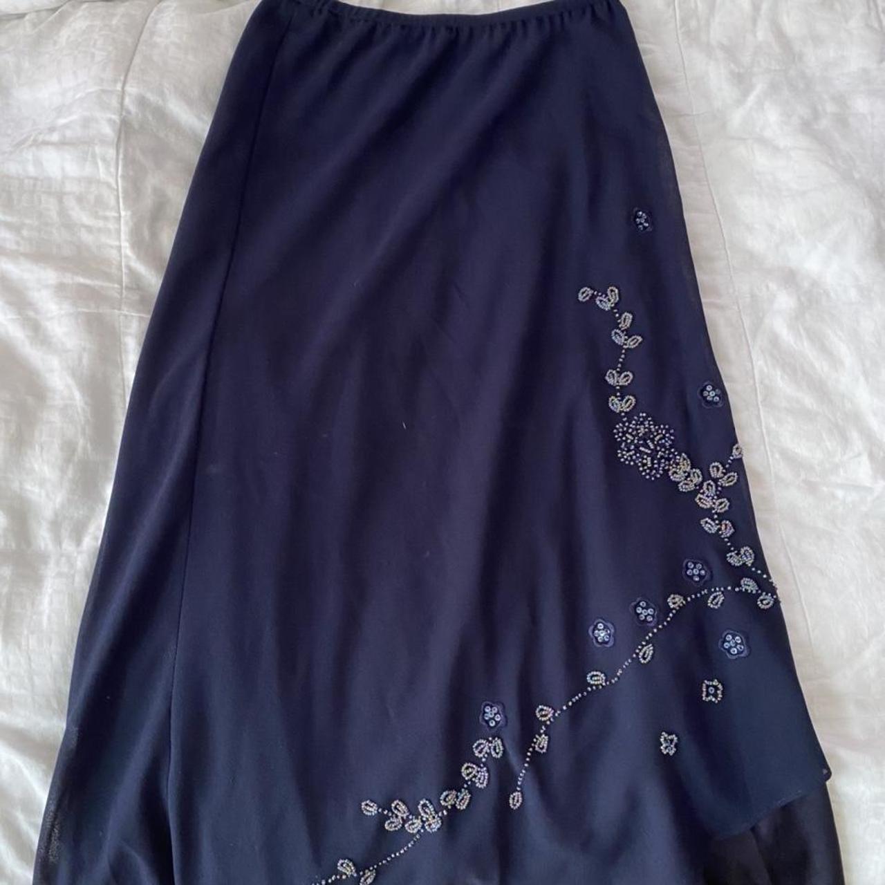 navy maxi skirt, vintage with beading on the left... - Depop