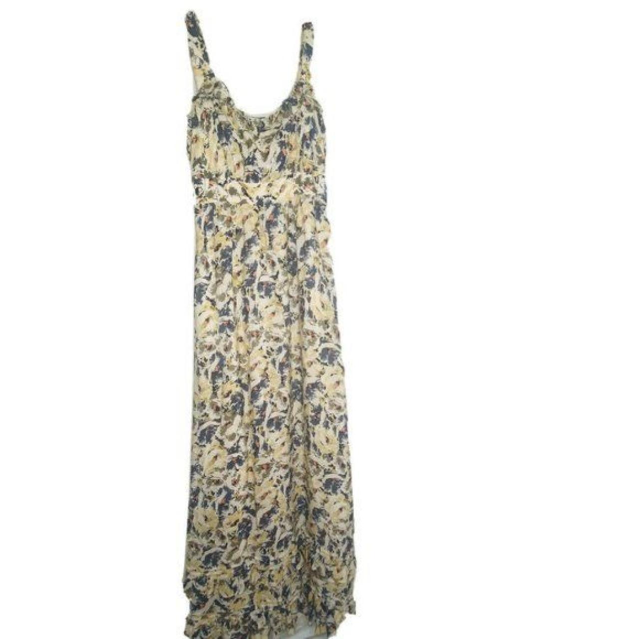 This pretty maxi dress is from Anthropologie - Depop