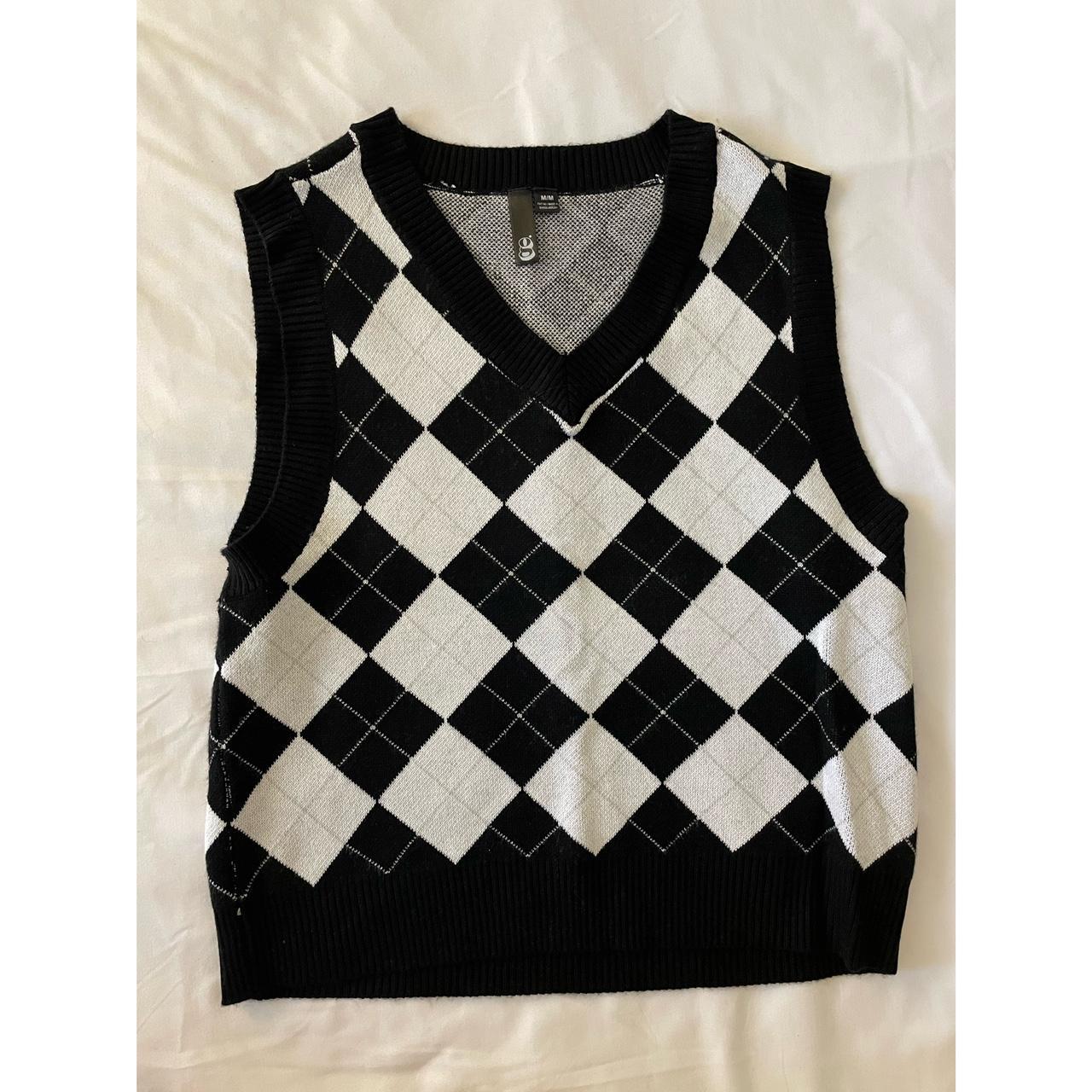 Garage black and white sweater vest Size M Slightly... - Depop