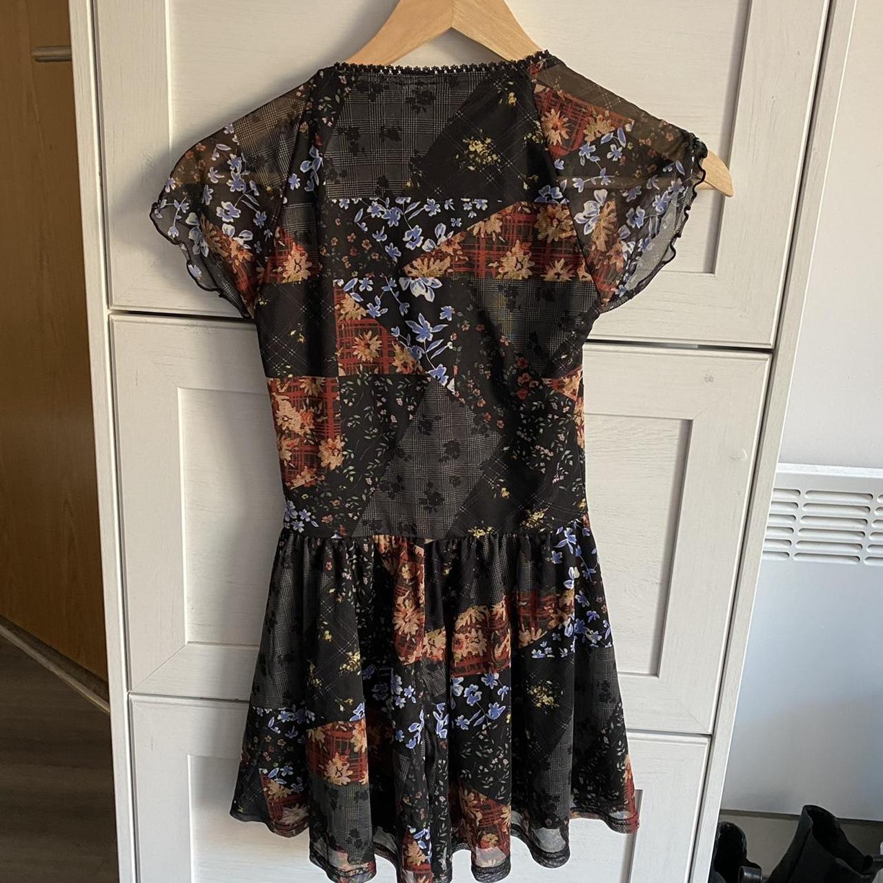 urban outfitters mesh black floral playsuit in size... - Depop