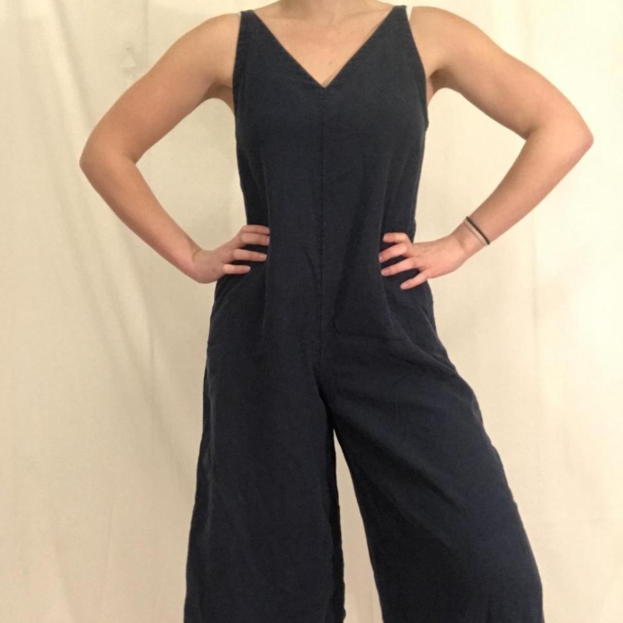 Stunning Uniqlo jumpsuit. Super flattering and great... - Depop