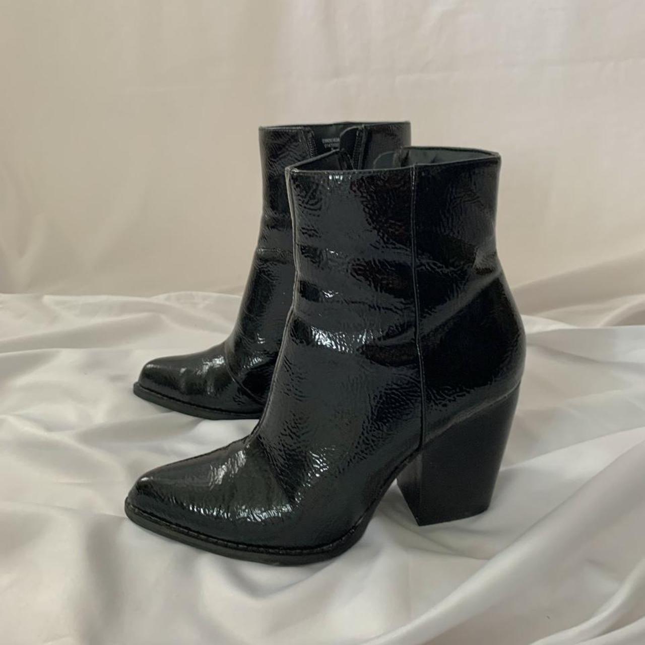 Black faux leather ankle boots with zip on the side... - Depop