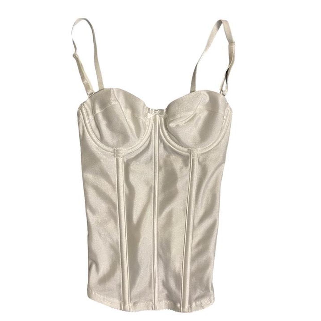 Vintage sleek white corset! With bow detail in the... Depop