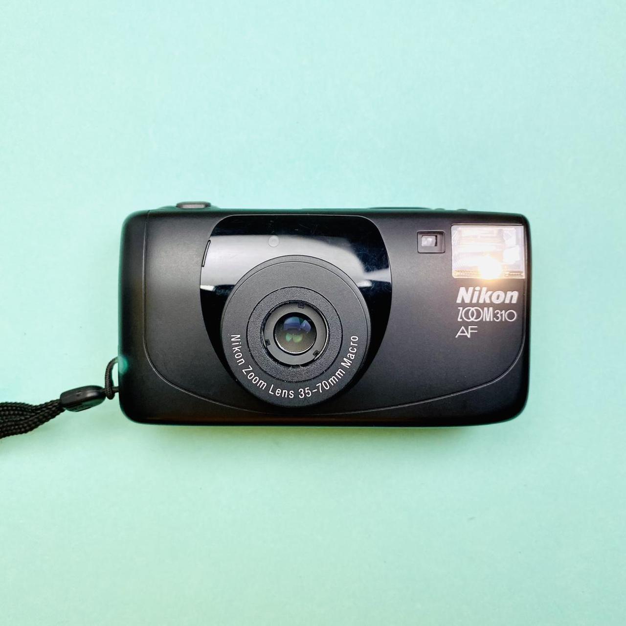 Nikon Zoom 310 Af Review NIKON ZOOM 310 AF, ??Battery And