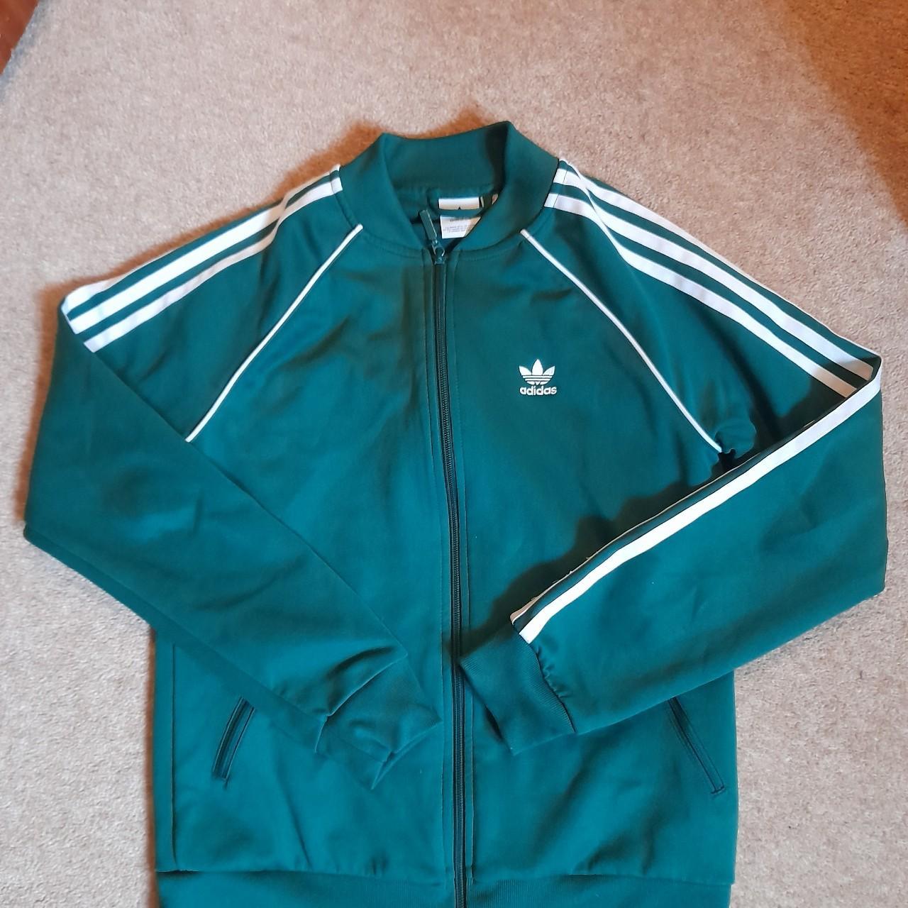 Dark green adidas track jacket Fairly fitted, not... - Depop