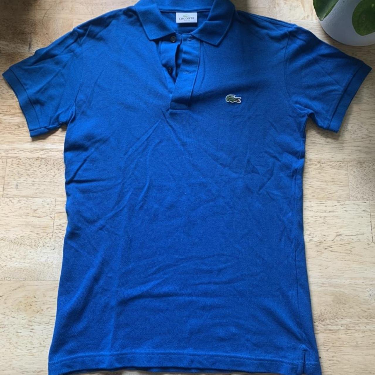Blue Lacoste polo shirt Perfect condition - never... - Depop
