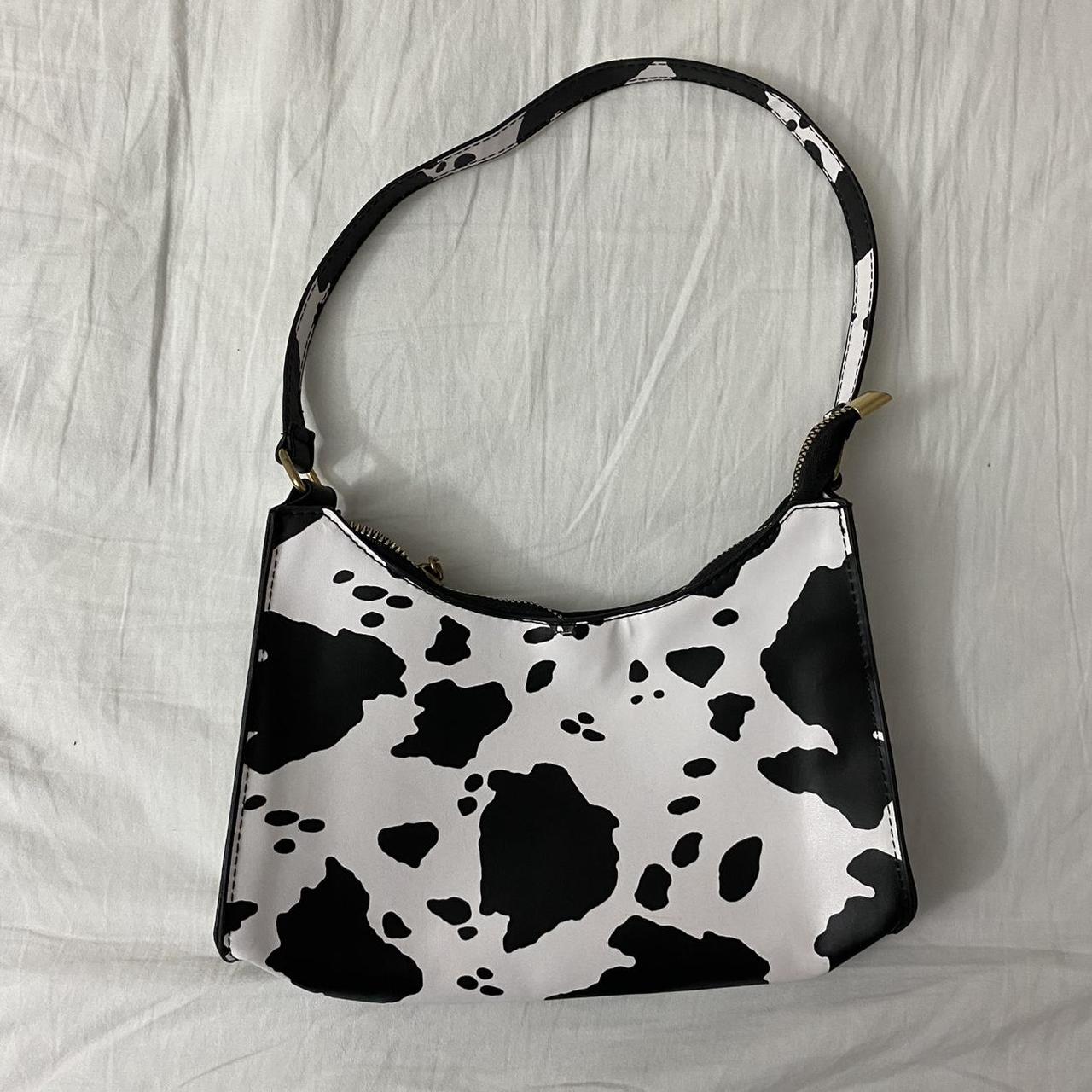 faux leather cow print shoulder baguette bag with Depop