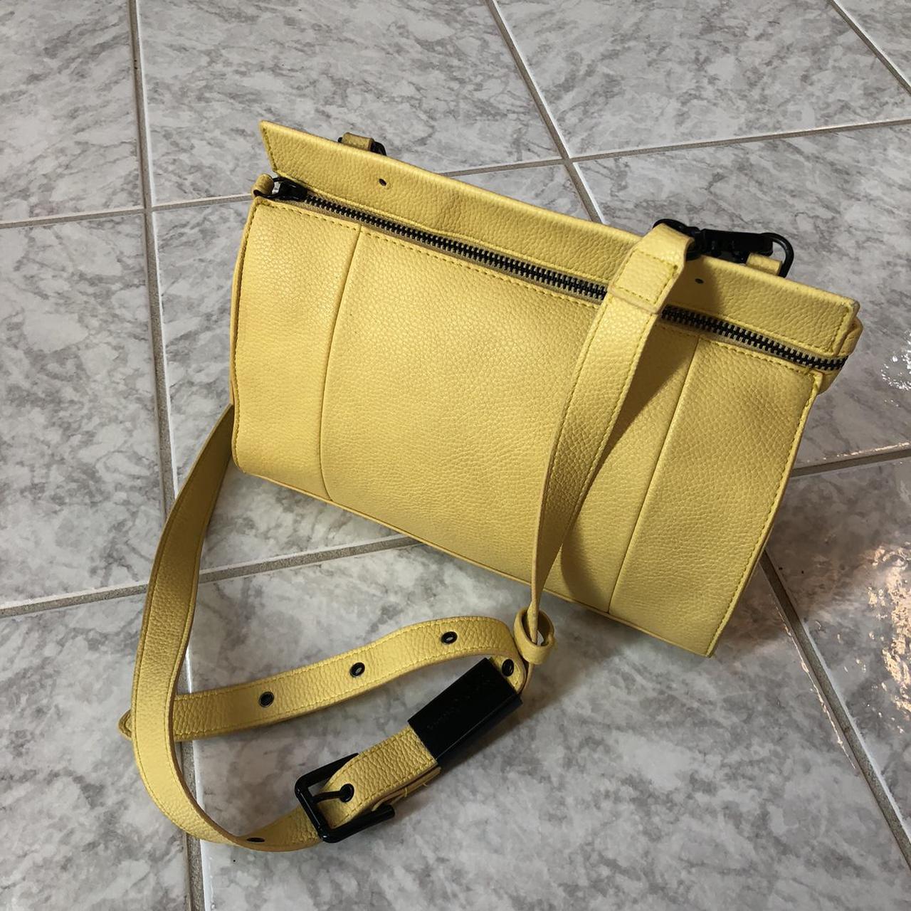 Yellow leather purse by Foley + Corinna. Has black... - Depop