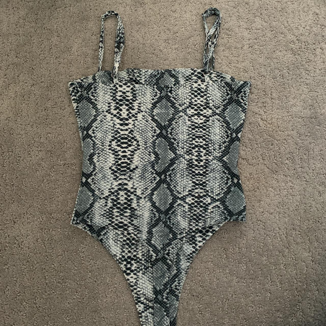 Salty snakeskin bodysuit, great condition, no longer... Depop
