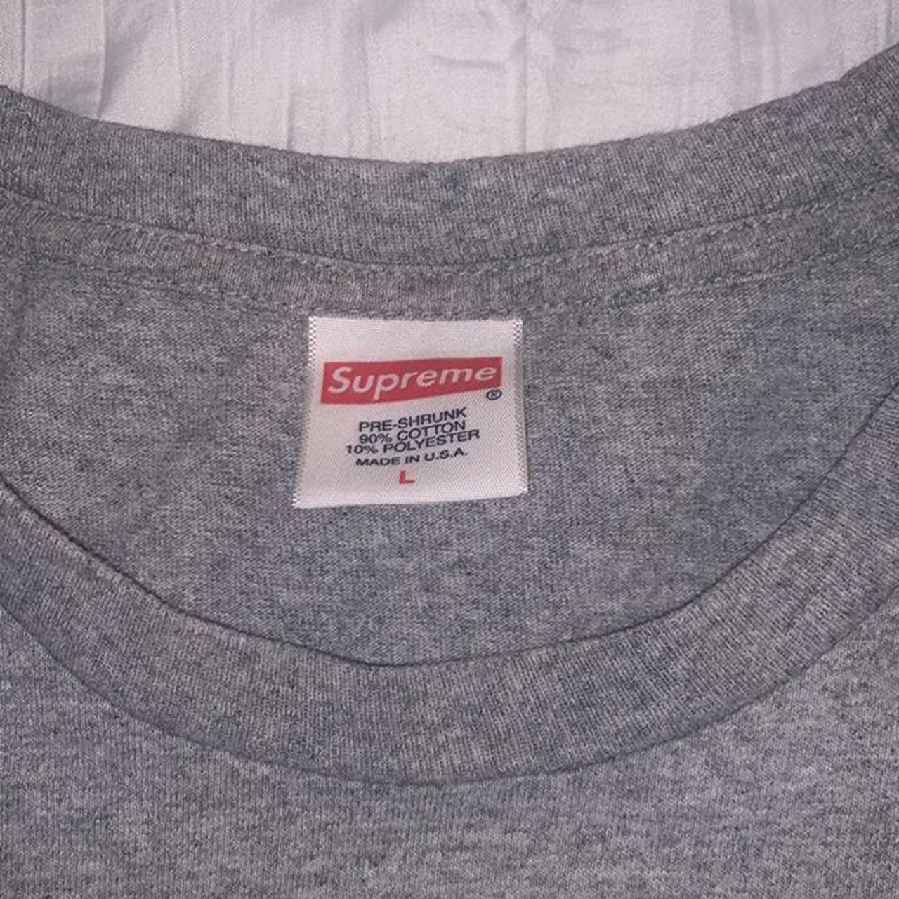 Supreme shirt outlet tag