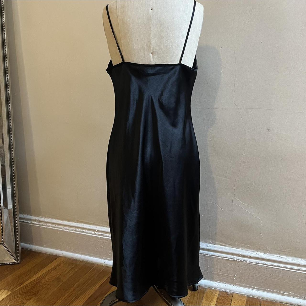 Classic, midi length black silk dress. Vintage... - Depop