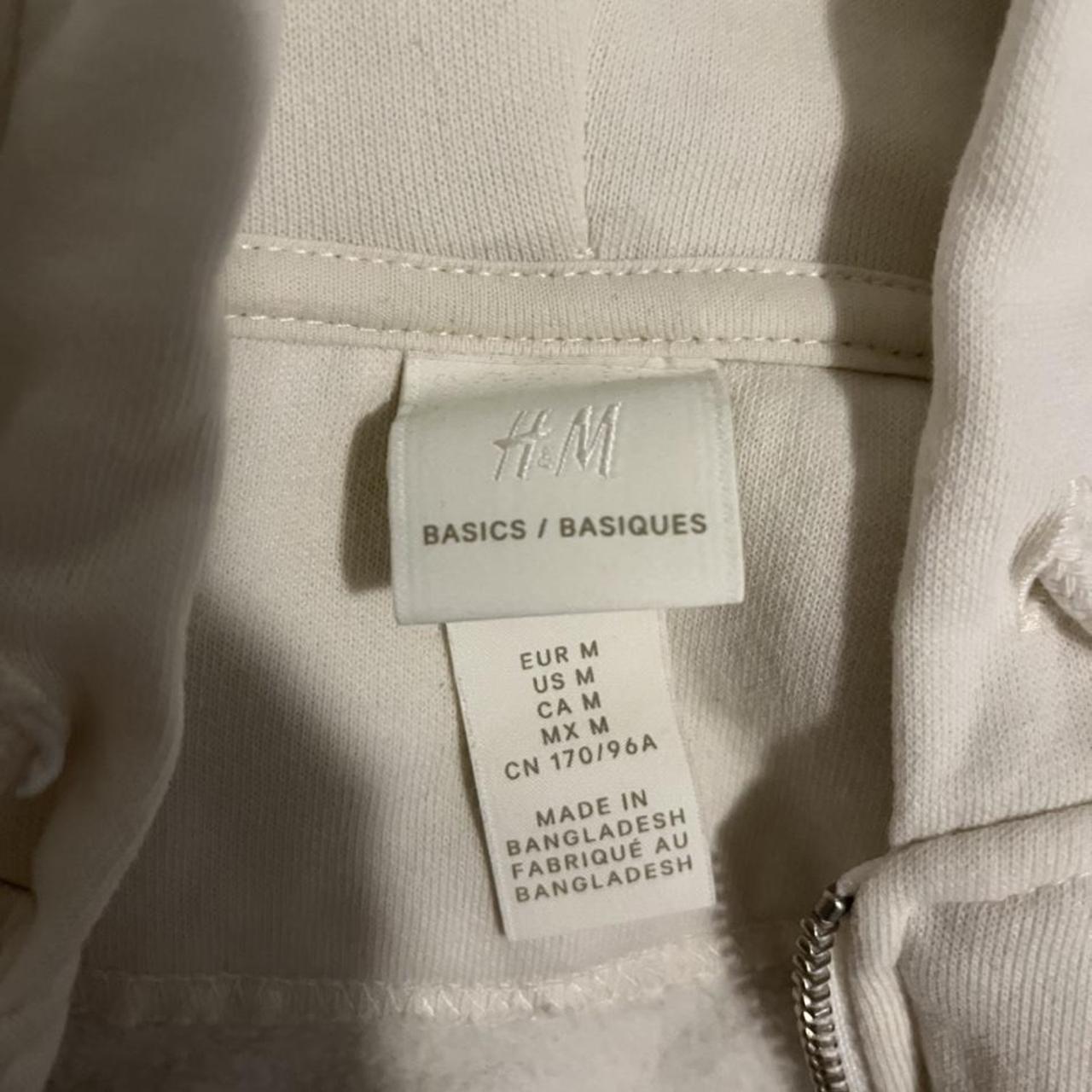 H&M white zip up. Kinda looks like a brandy Melville... Depop