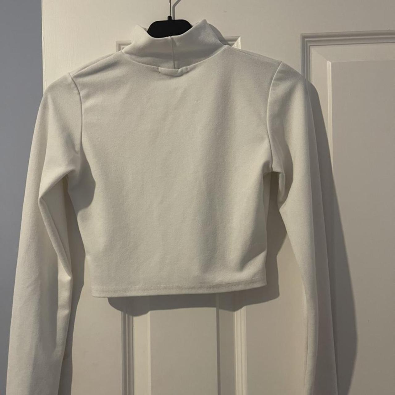 Lovely white crop top, with long sleeves and a... - Depop