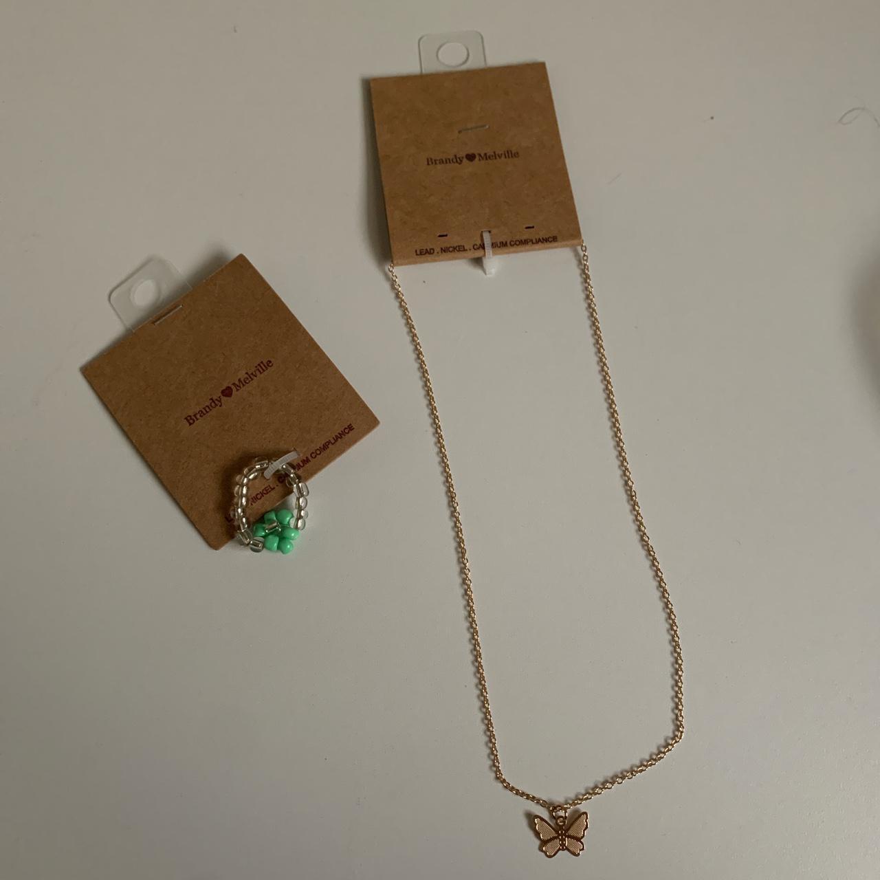 Brand new brandy Melville gold chain necklace with... Depop