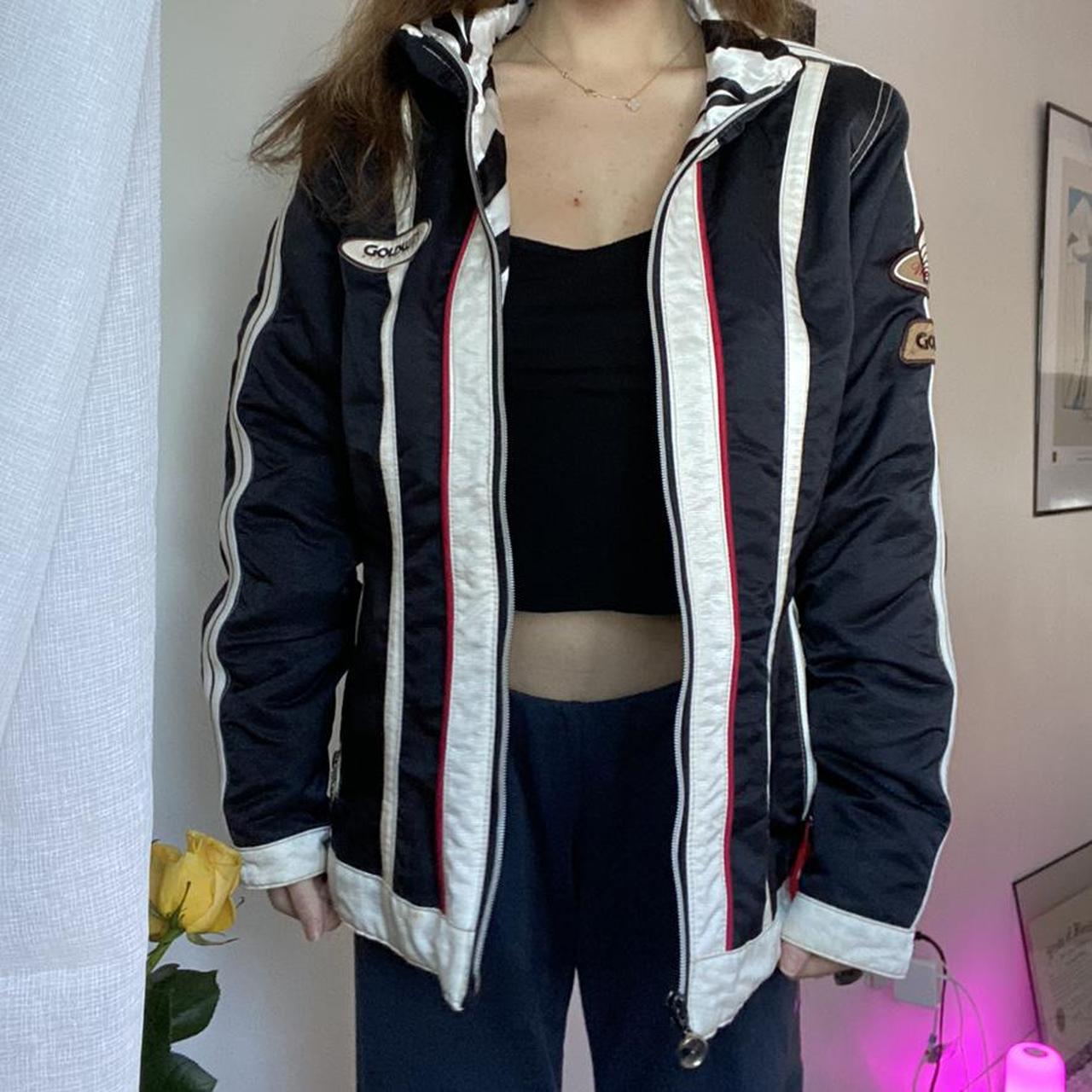 Vintage ski jacket black and white striped lining.... - Depop