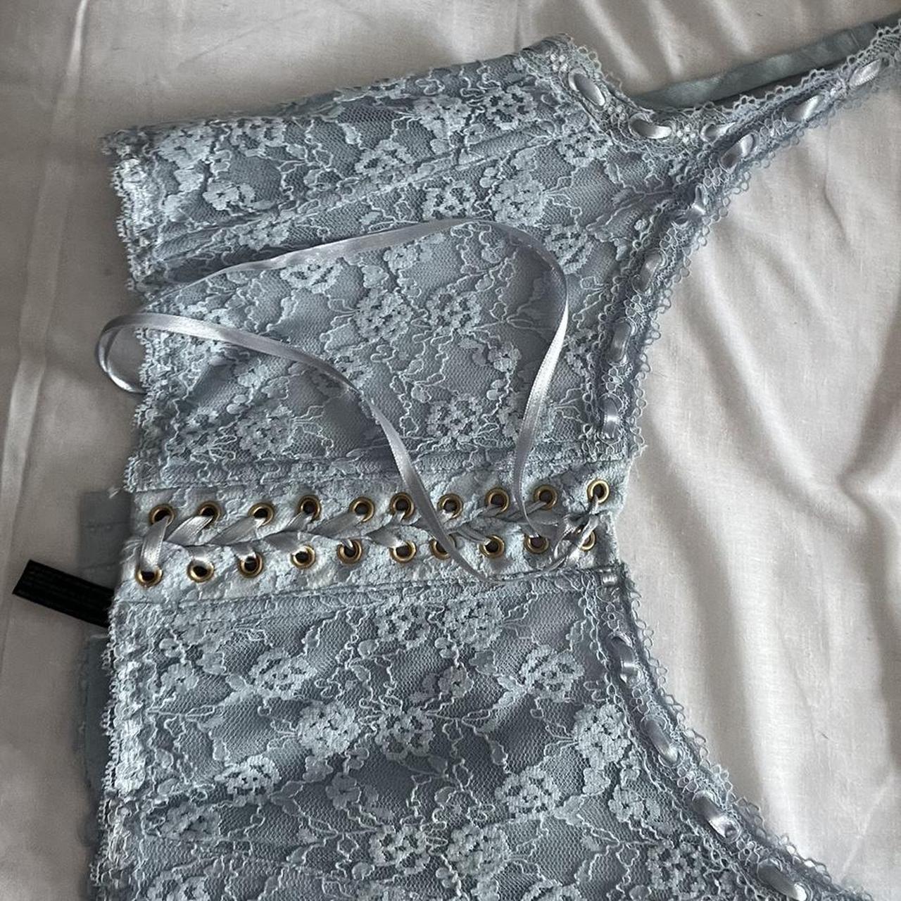 light blue lace corset from urban outfitters, worn once Depop