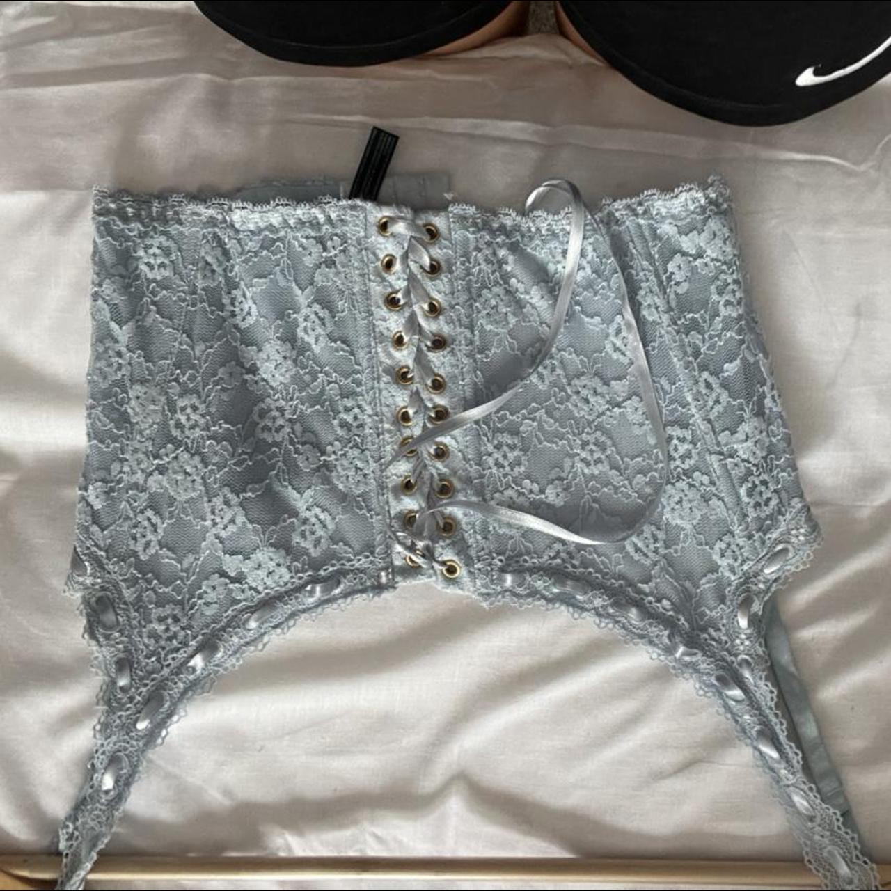 light blue lace corset from urban outfitters, worn once Depop