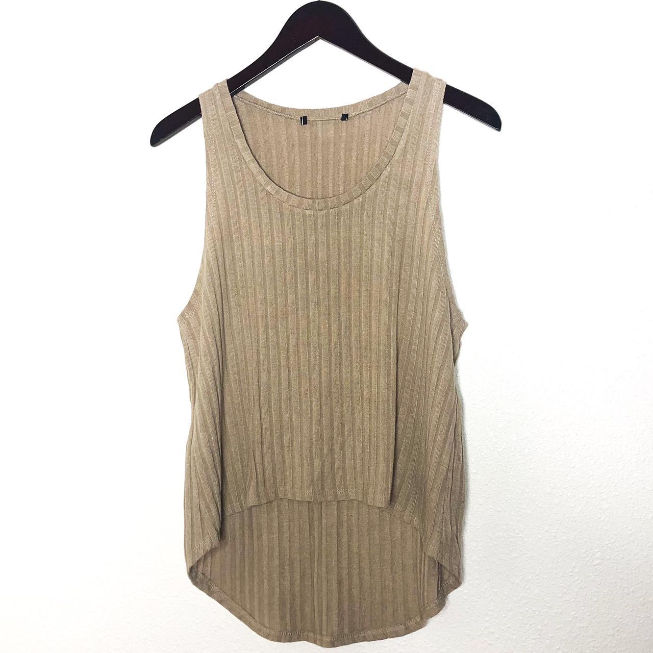 Tan knit ribbed tank top! This is super soft and... Depop