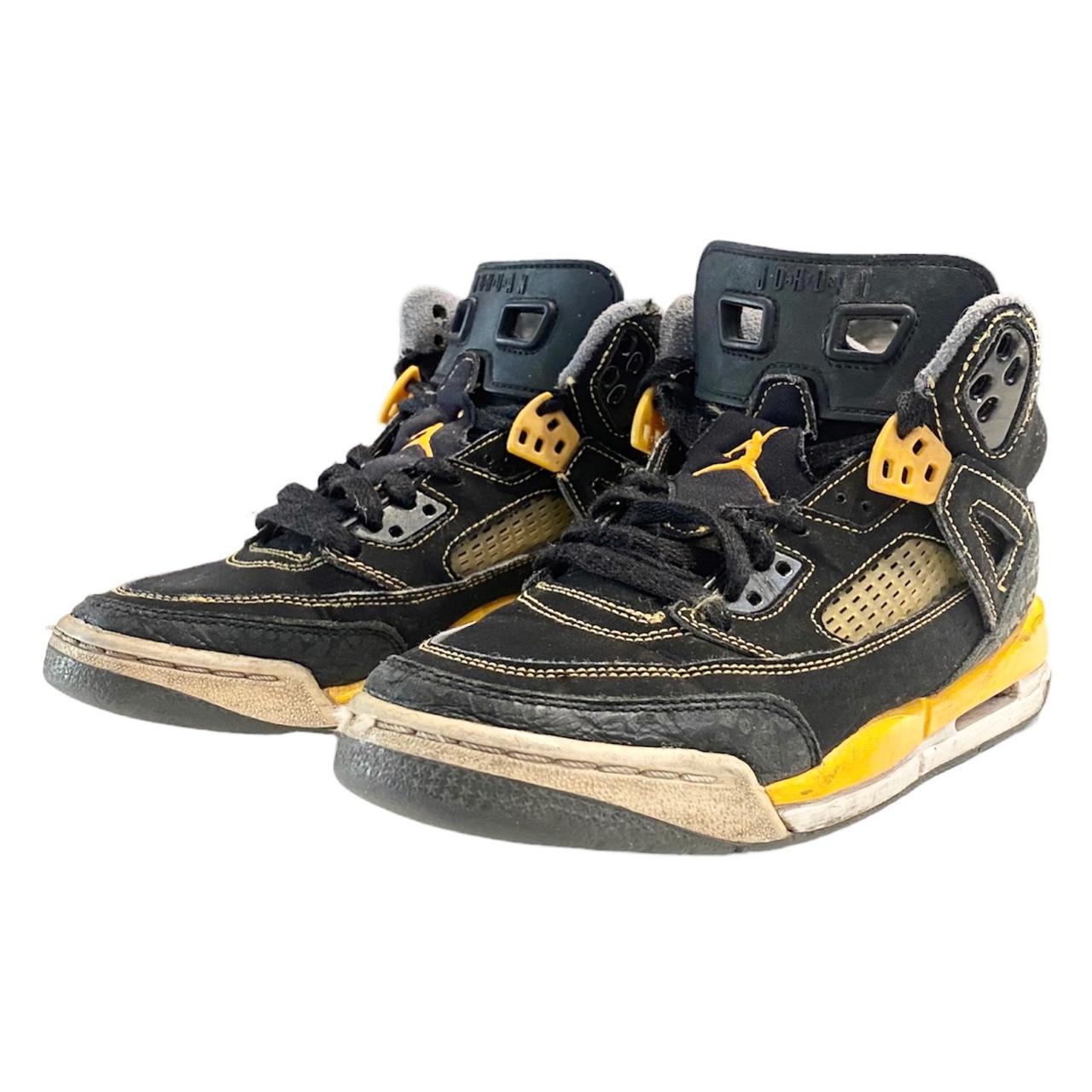 spizike black and yellow