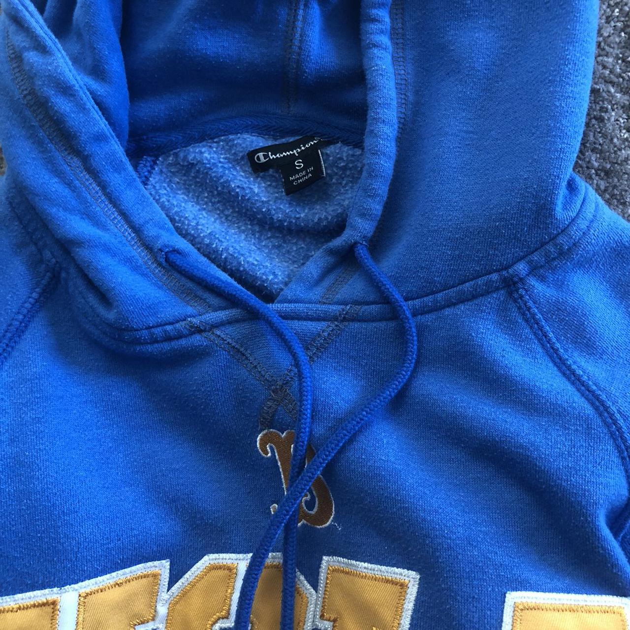 Champion UCLA bruins hoodie. not oversized and would... - Depop