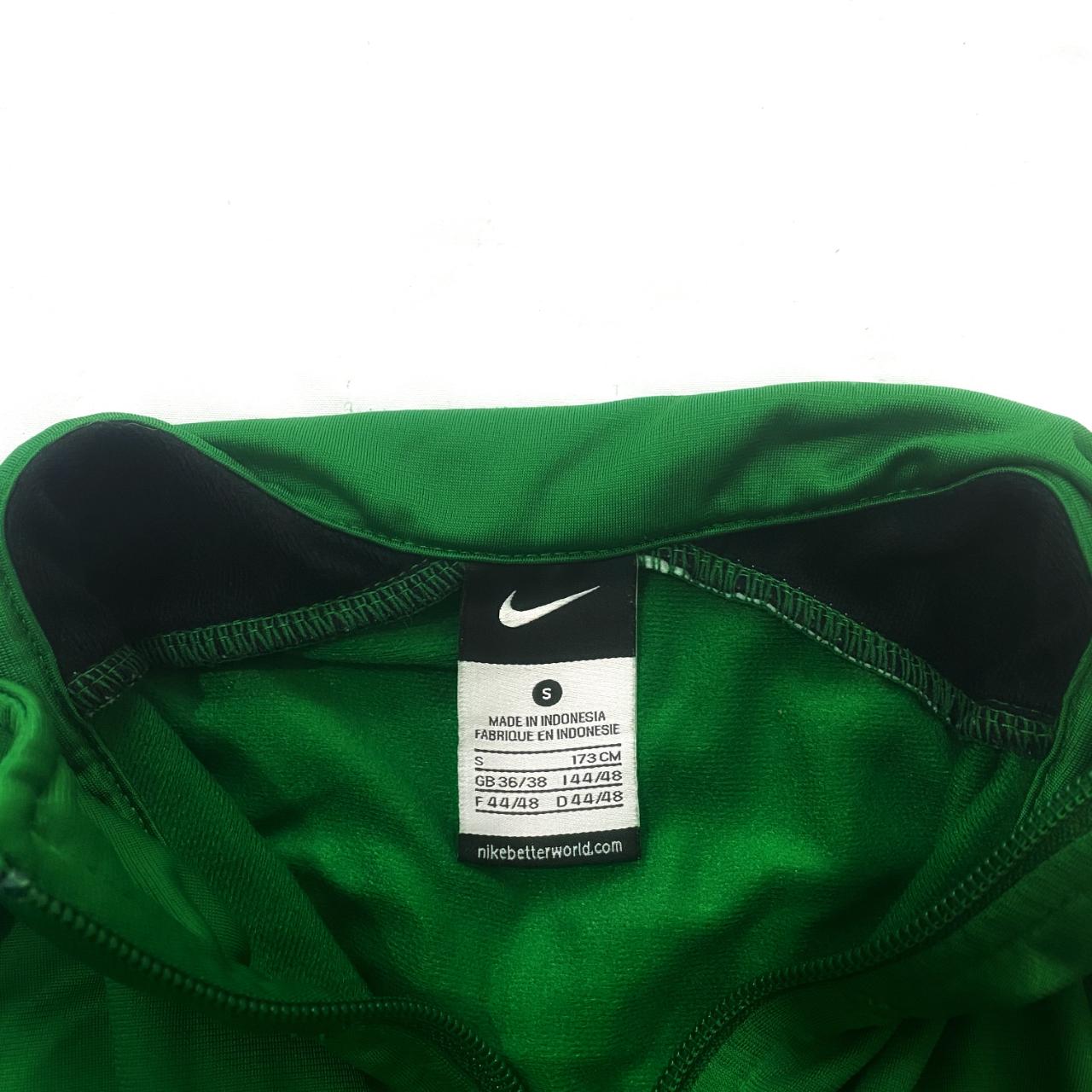 Nike green and black with white accents zip up... - Depop