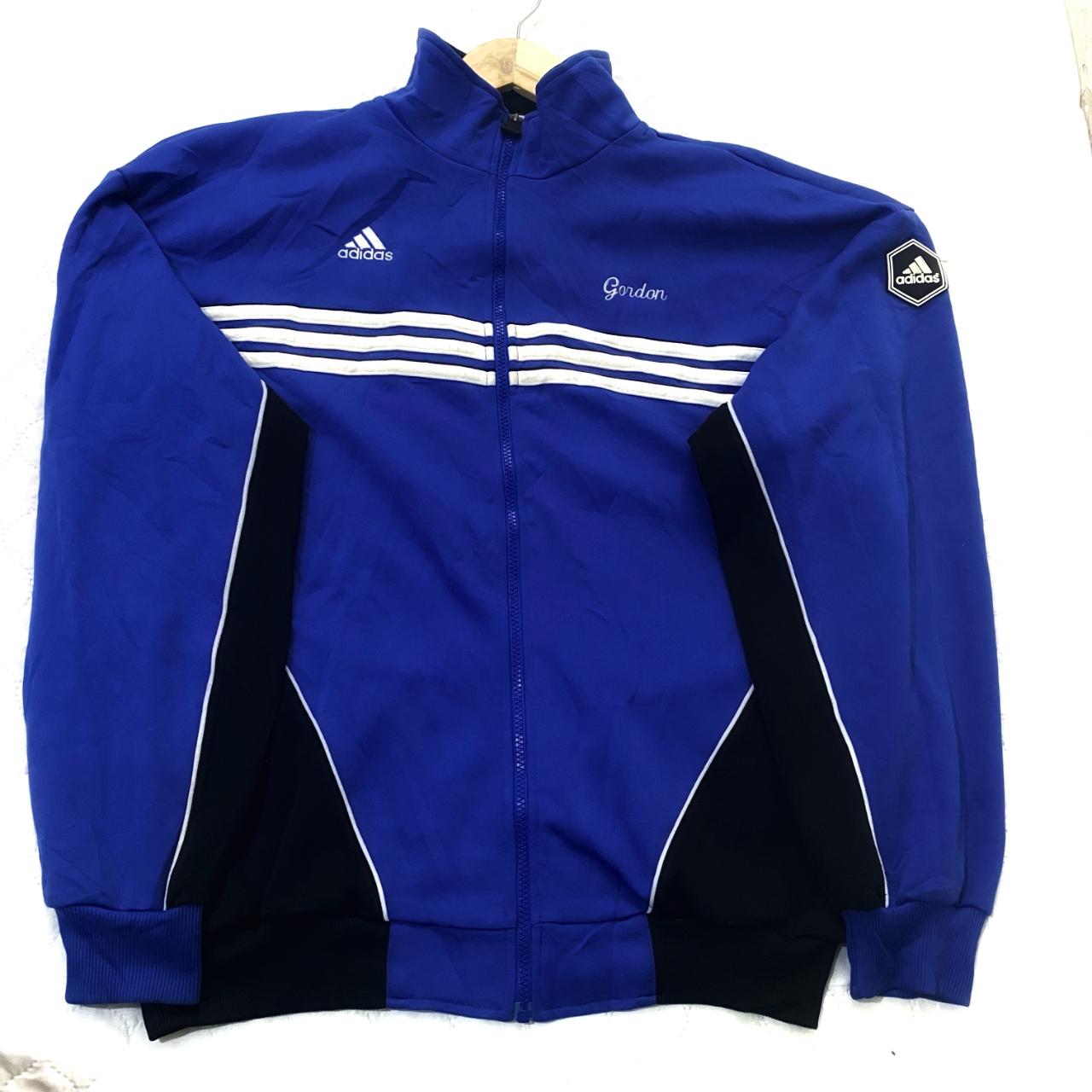 Adidas blue and black with white accents zip up... - Depop
