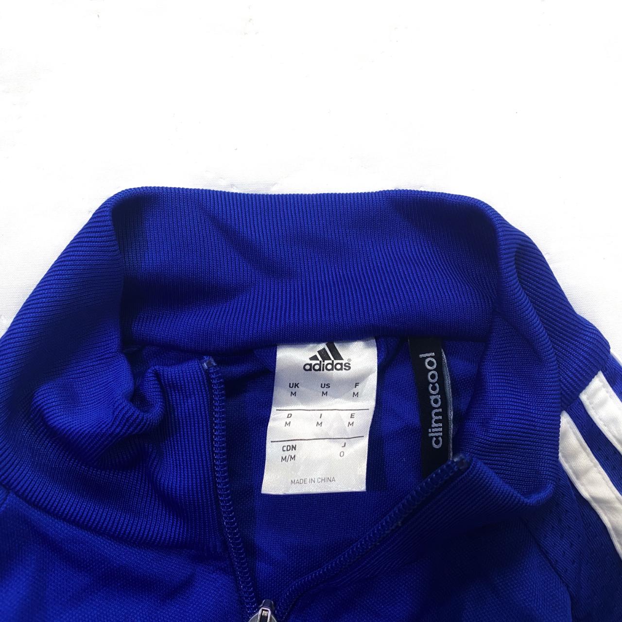 Adidas chelsea blue with white accents zip up... - Depop