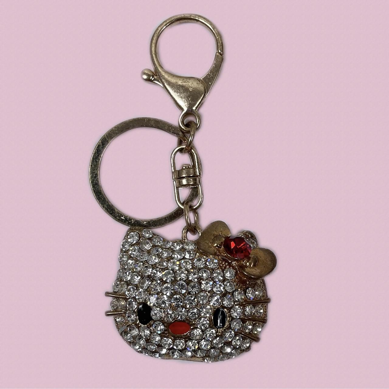 Gold Hello Kitty keychain with sparkly gemstone... Depop
