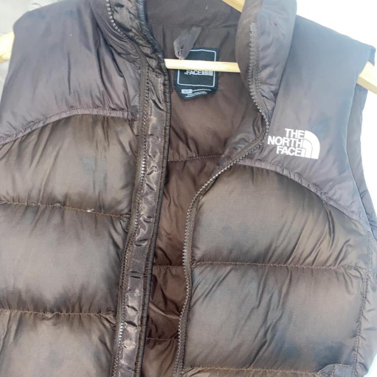Chocolate brown the north face body warmer, size... - Depop