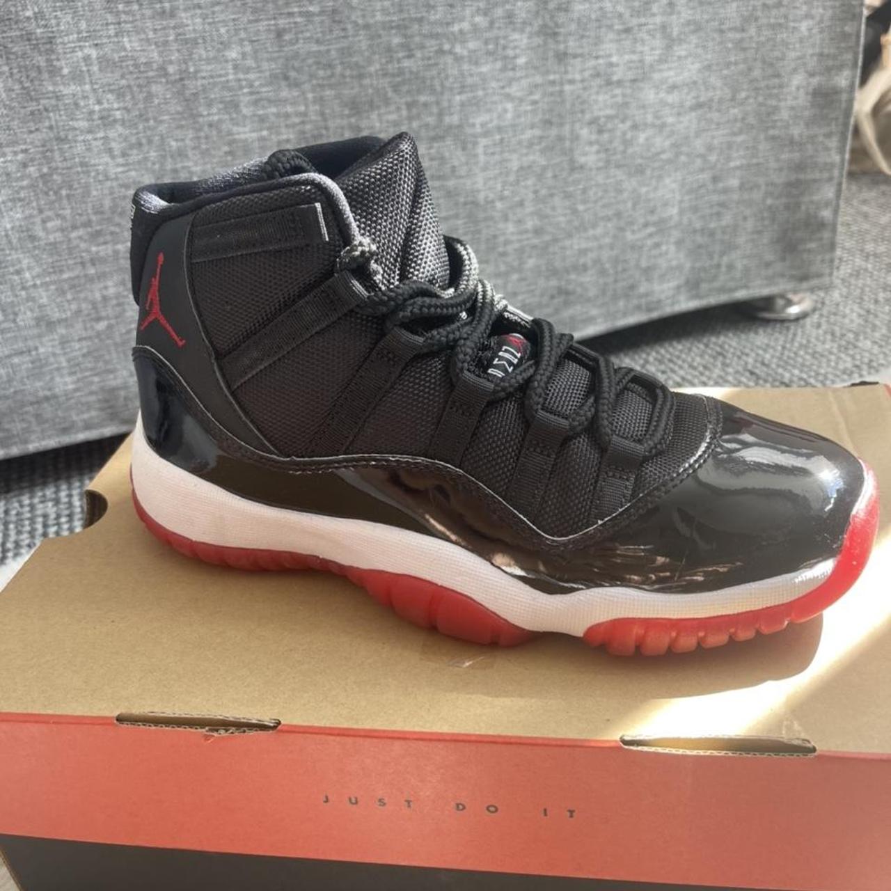 how much are the black and red jordan 11