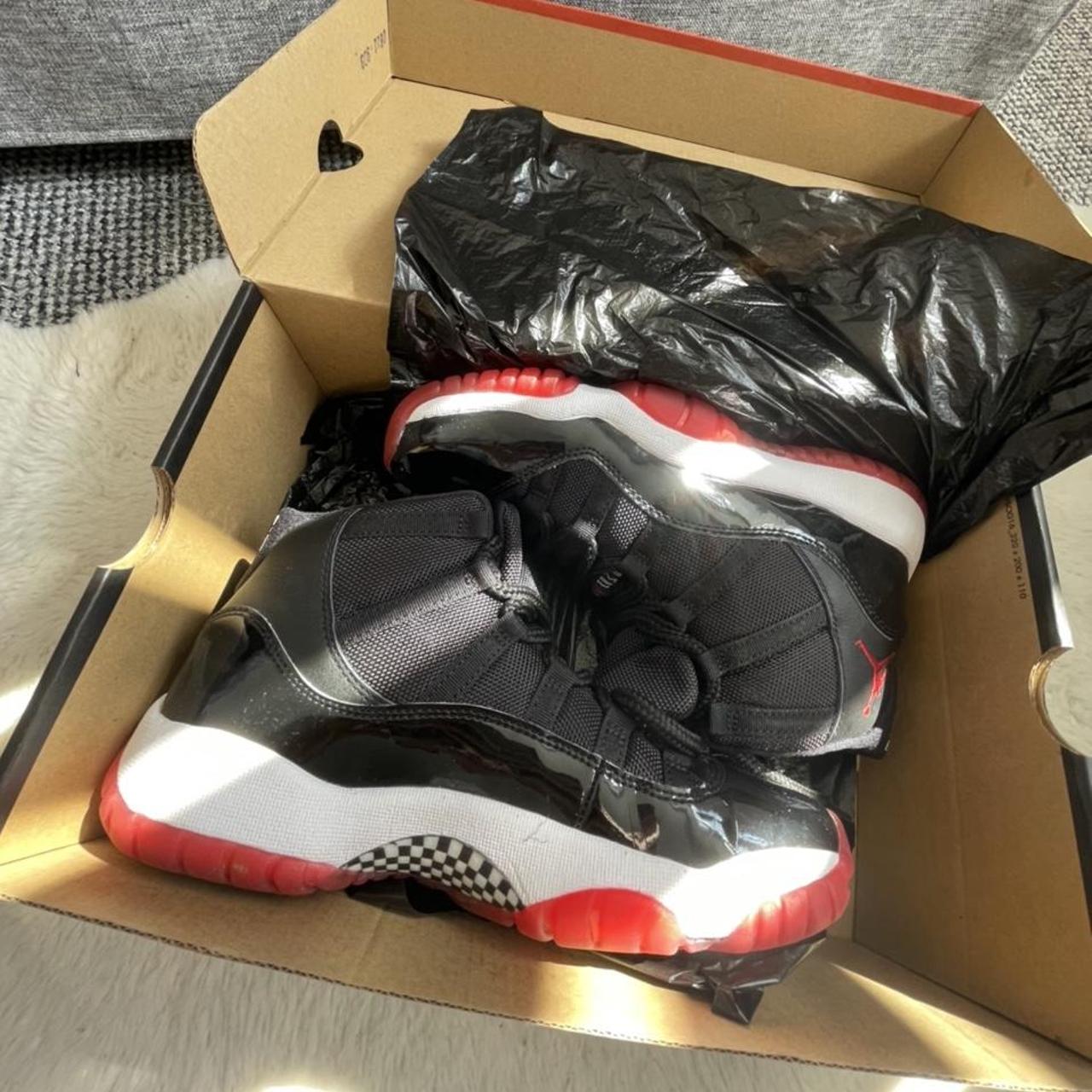 how much are the black and red jordan 11