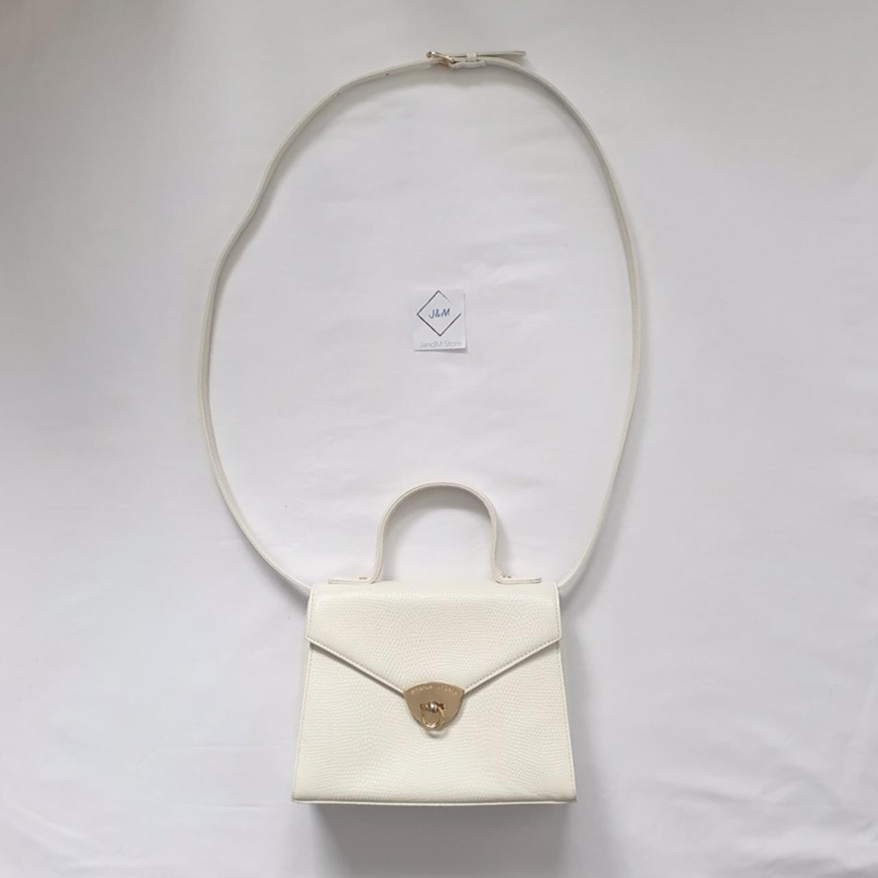 70. Emanuel Ungaro white handbag. , Condition 9/10...