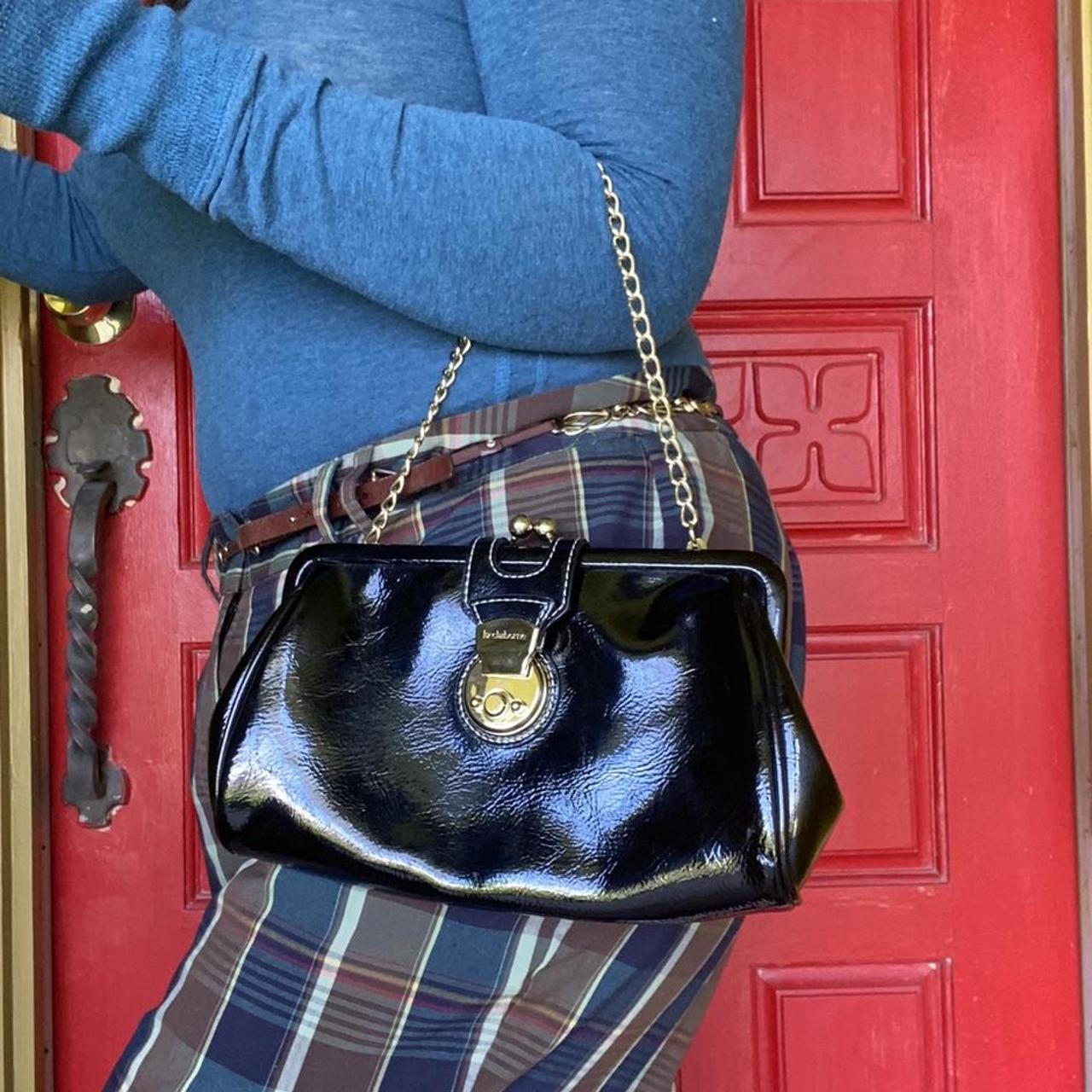 Sexy Liz Claiborne Glossy Black Clutch. Features