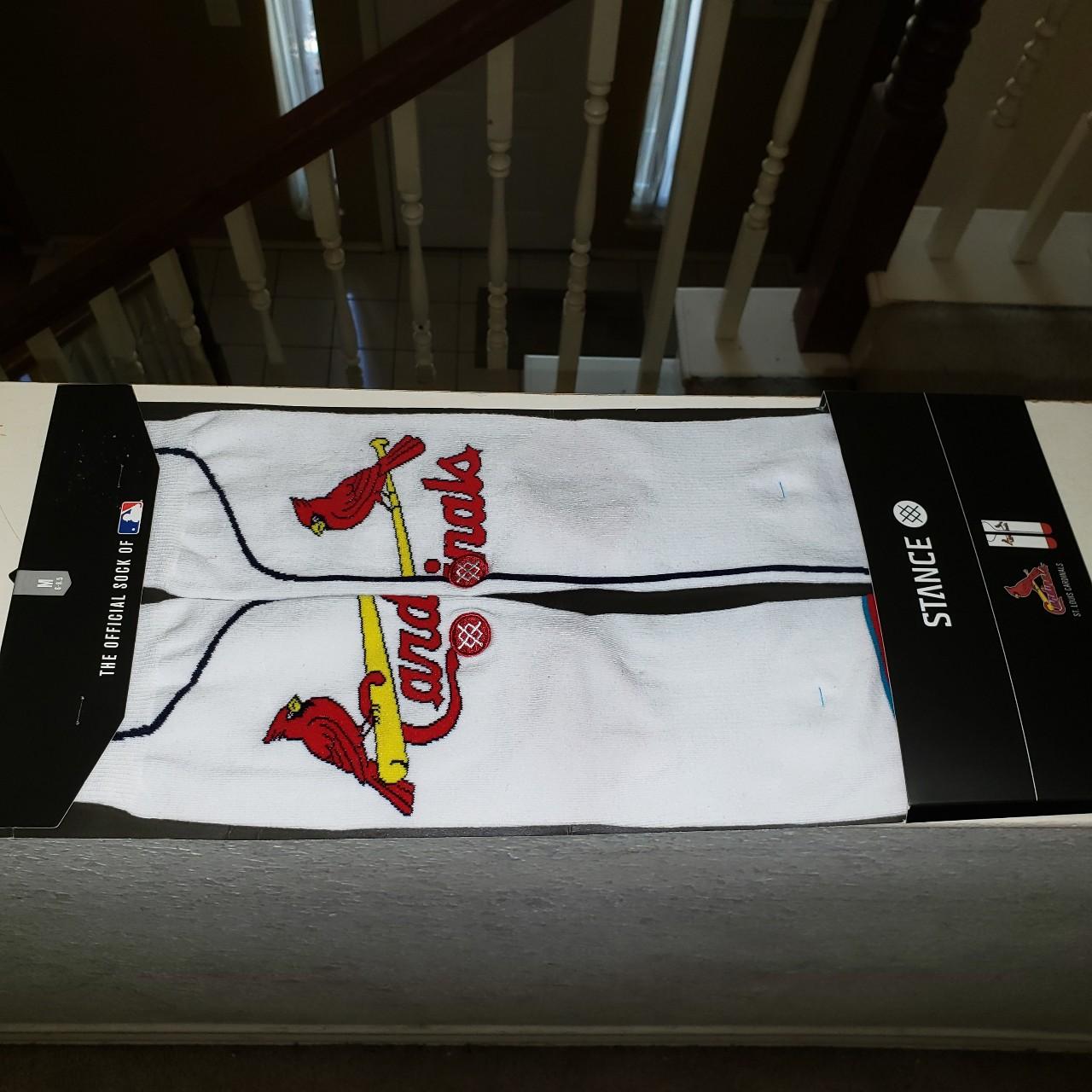 This is a pair of St. Louis Cardinals socks by - Depop